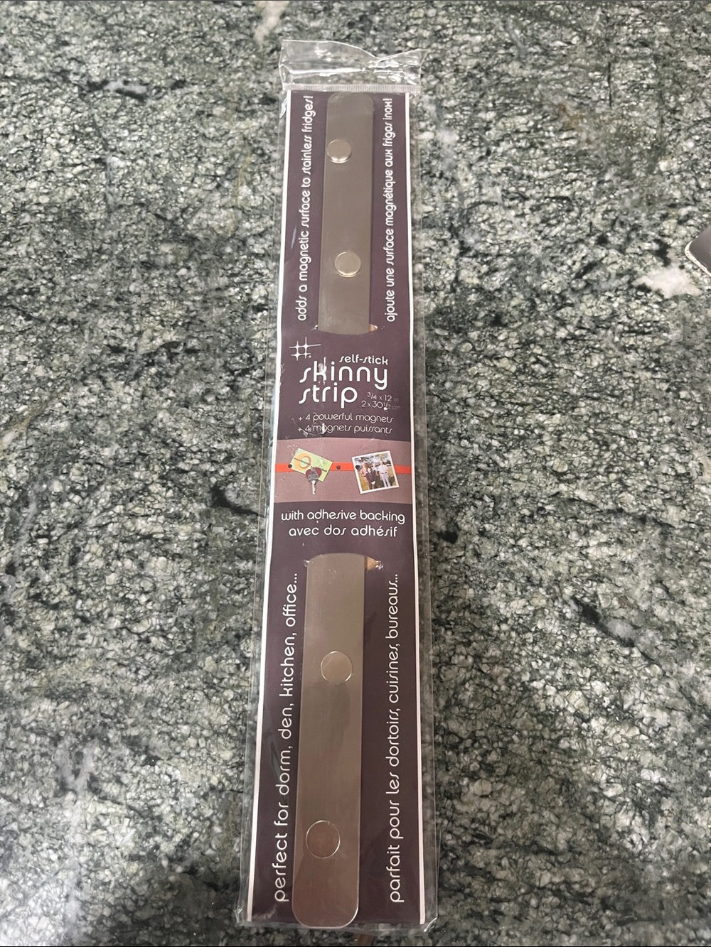 Magnetic strip with magnets